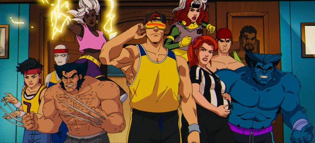 Eine bunte, dynamische Gruppenaufnahme der X-Men aus der Zeichentrickserie "X-Men '97". Im Vordergrund stehen Wolverine (oben ohne, mit ausgefahrenen Krallen) und Cyclops (in gelbem Tanktop und Sonnenbrille), der seinen Bizeps beugt. Um sie herum versammelt sind: links Jubilee, ein blasser Mutant mit roten Streifen im Haar und Storm (mit Blitzen um sie herum); rechts Rogue, Jean Grey (in Schwarz-Weiß), ein Mutant mit roter Kappe und ein anderer in dunkler Kleidung, und Beast (groß, blau, pelzig). Die Gruppe steht in einem Raum mit Holztüren und gerahmten Bildern an den Wänden.