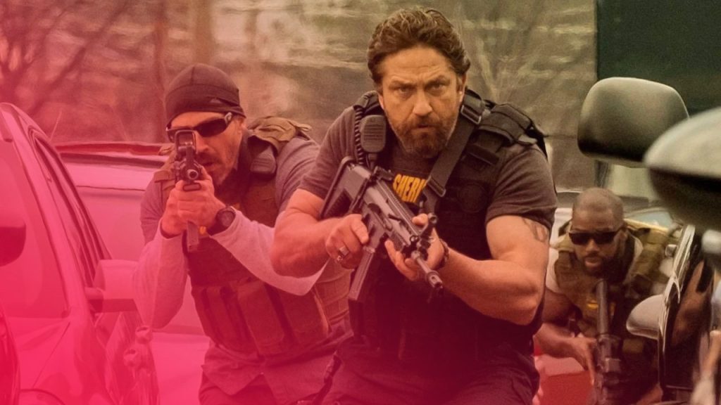 Drei bewaffnete Männer in taktischer Weste und Militärkleidung, in Deckung gehend, der vordere hat einen Bart und hält ein Gewehr.